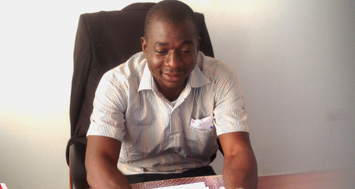 Mr Albert Adongo in his office